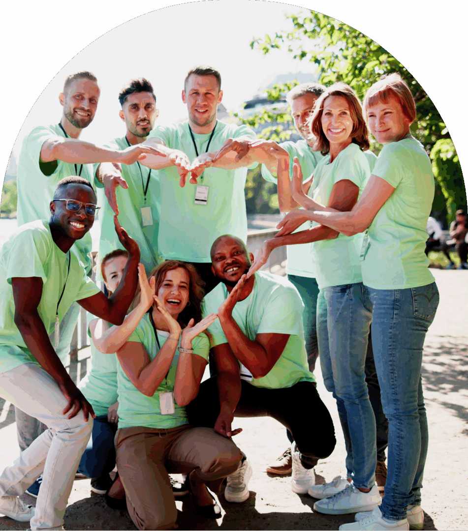 Team wearing matching green shirts outdoors